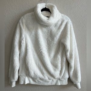 Brand new (w/o tags) fuzzy white sweater